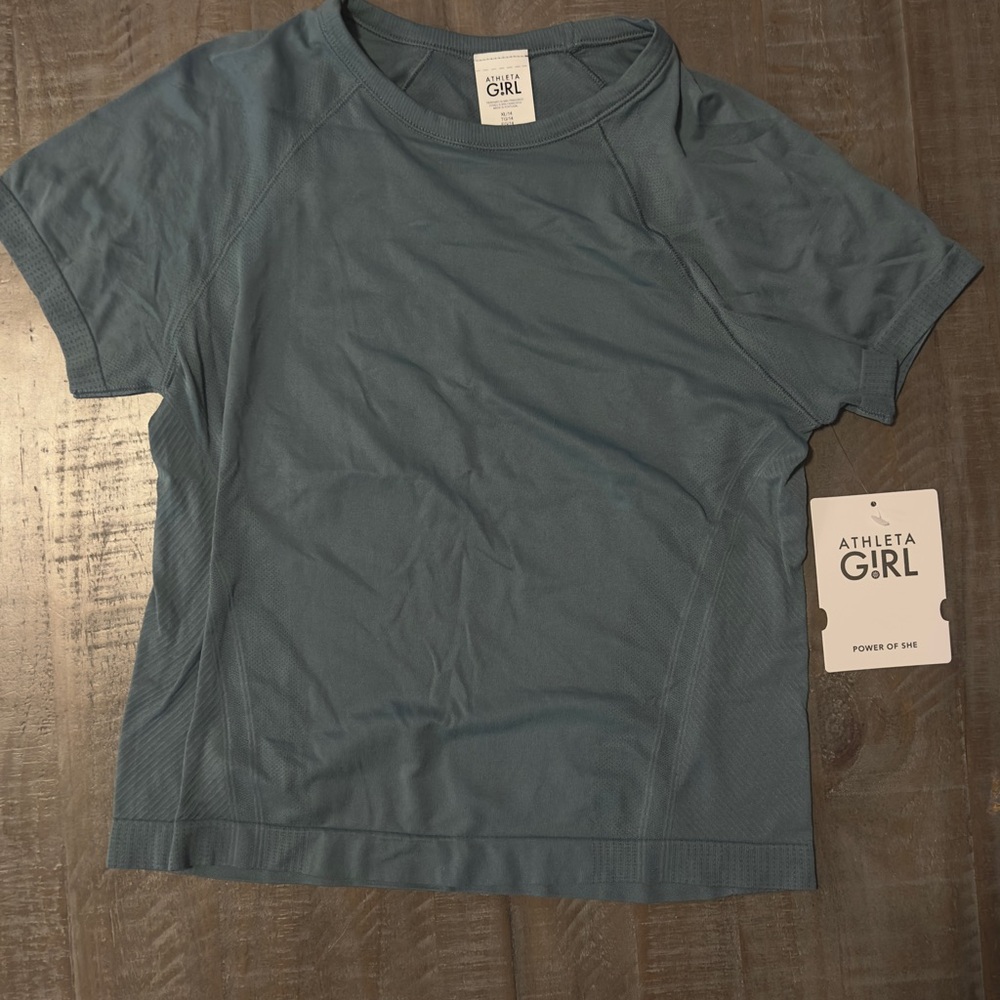 Brand new with tags xl child blue Athleta shirt (just bought in the wrong size)